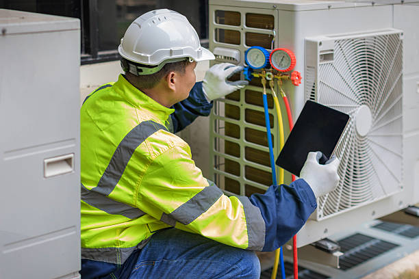 Professional Heat Pump Repair technician working in Whitesboro, NY